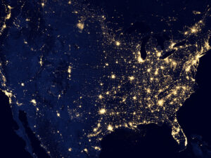 A satellite image of the united states at night.